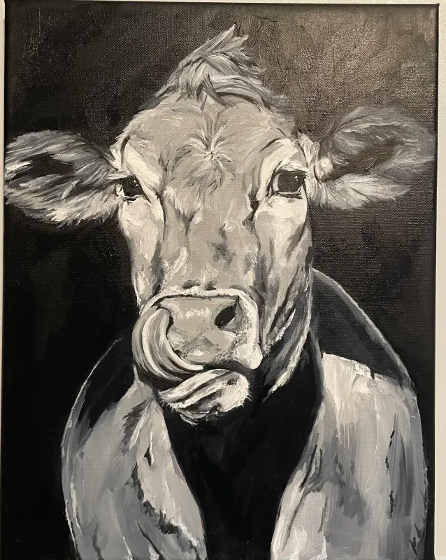 Black and white painting of a cow's face looking straight ahead, painting by Kayla Hixon